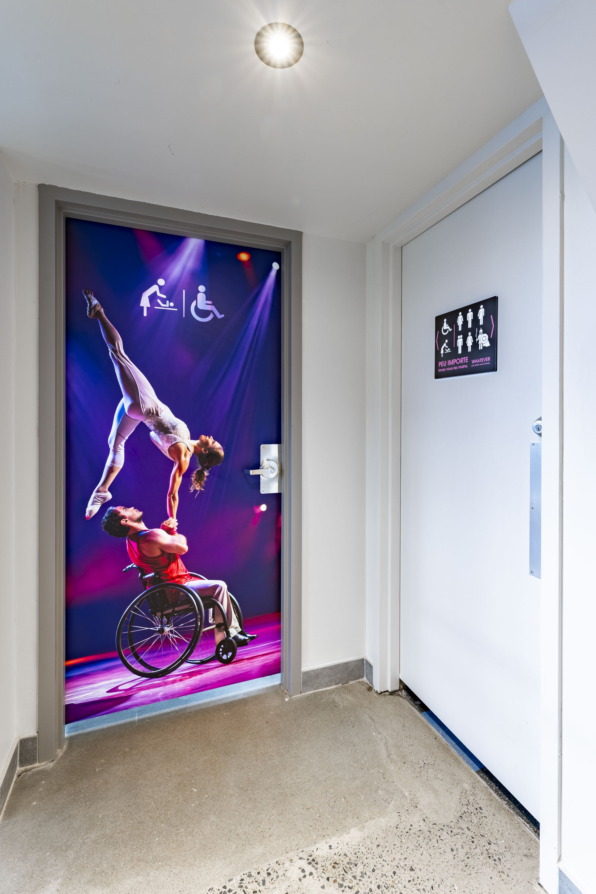 a door with a poster of a man in a wheelchair and a woman in a wheelchair